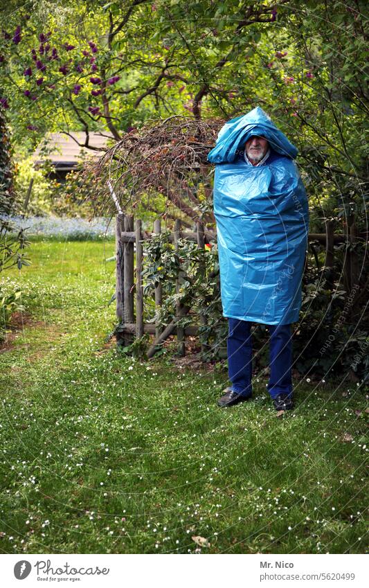 old bag Garbage bag Blue Plastic packaging Protective clothing Sack Working clothes Fashion Mask Abstract Whimsical Exceptional Disguised Crazy Environment