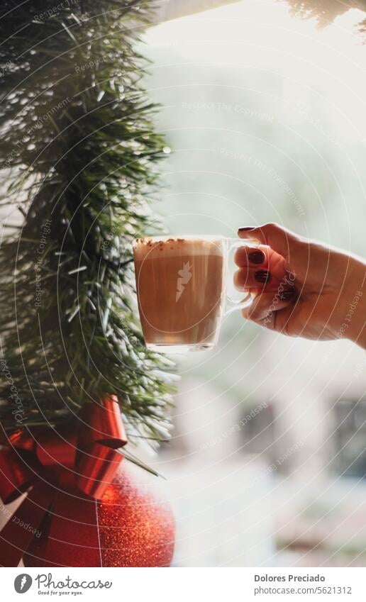 A cup of Italian-style coffee with milk ideal for the Christmas season arabica aroma aromatic art background beans beverage black breakfast brown cafe caffeine