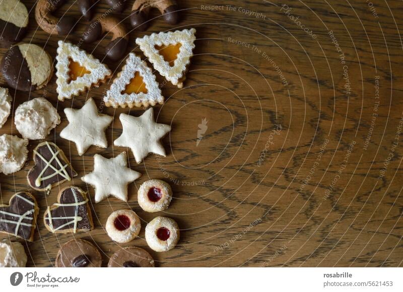 Colorful Christmas cookies on a wooden table Christmas biscuit Cookie Christmas baking pre-Christmas period Christmas & Advent biscuits Anticipation