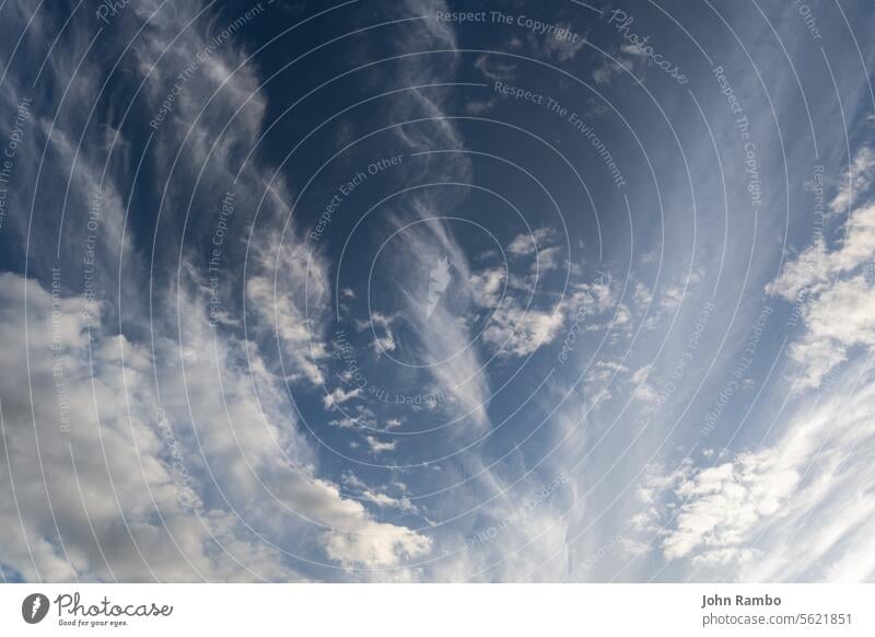 blue sky with mixed clouds wide angle upward shot at summer daytime feather unadorned space white weather heaven light bright cumulus nature outdoor sunlight