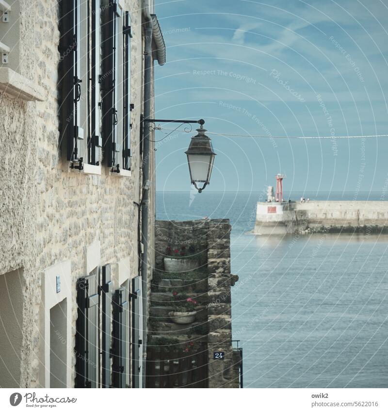 La Manche Village Arromanches-les-Bains houses streetlamp Street lighting Sky cirrostratus clouds Place France Normandie Arrondissement Bayeux