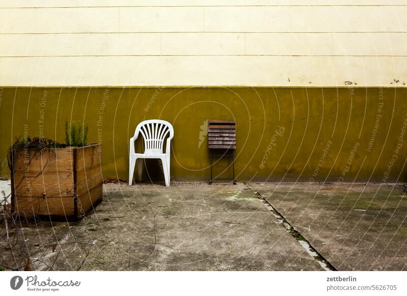 Two chairs in the backyard Old building Architecture on the outside Berlin Fire wall city Germany Facade Building Capital city House (Residential Structure)