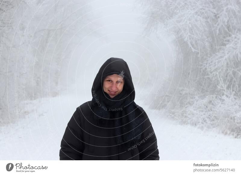 young woman in a black coat in a snowy landscape Woman Winter Snow White Coat Black Cold Forest Human being portrait chill cold snap Winter's day Winter mood