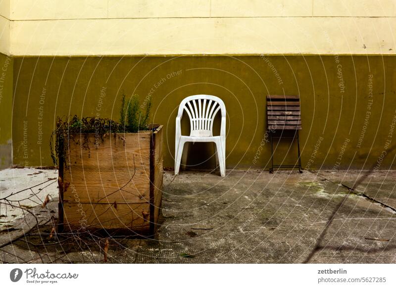 Two chairs in the backyard again Old building Architecture on the outside Berlin Fire wall city Germany Facade Building Capital city