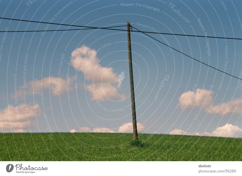 windmill Clouds Electricity pylon Green Cable Horizon Playing Beautiful weather Summer Minimal Calm Earth Sand Sky Nature Landscape Blue Far-off places Lawn