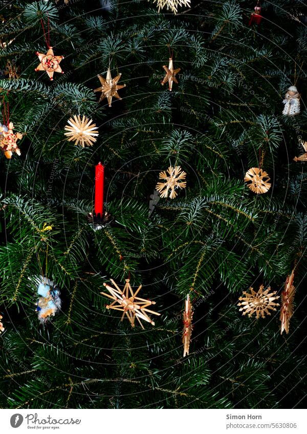 Christmas tree with straw decorations and candle Straw ornaments Straw stars shoulder stand Christmassy Anticipation Feasts & Celebrations Christmas & Advent