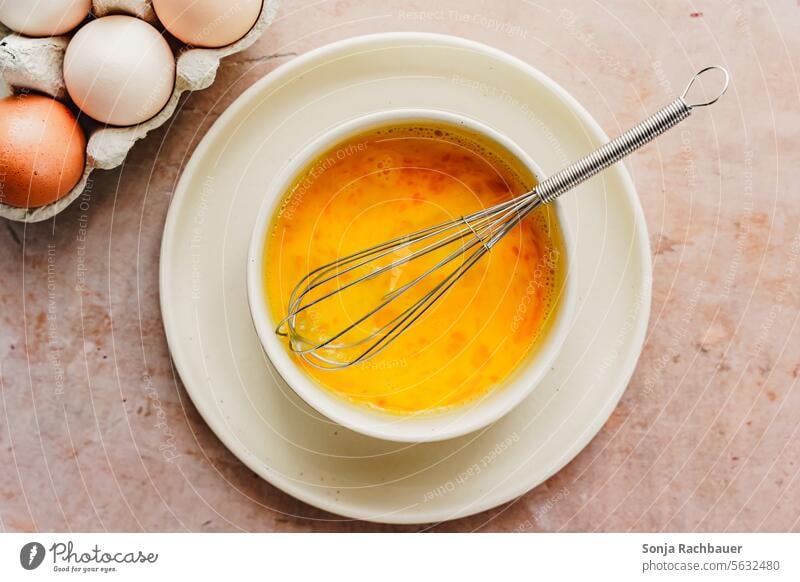 Eggs in a bowl. Scrambled eggs, top view. Breakfast Preparation Food Raw plan Morning Food photograph Brown Cooking Fresh Nutrition Vegetarian diet