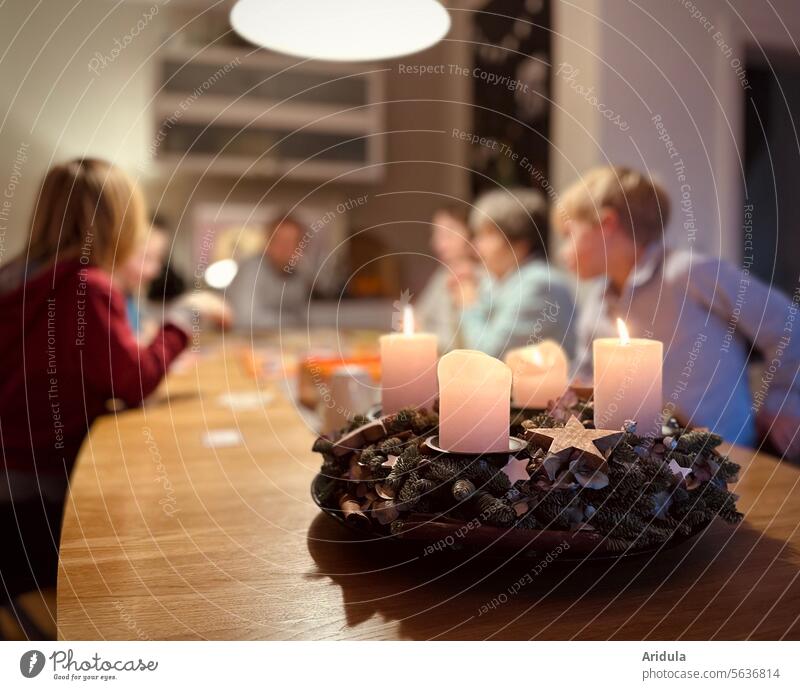 Family time during Advent Christmas wreath Christmas & Advent shoulder stand Feasts & Celebrations Candlelight Decoration Festive Cozy Moody Interior shot