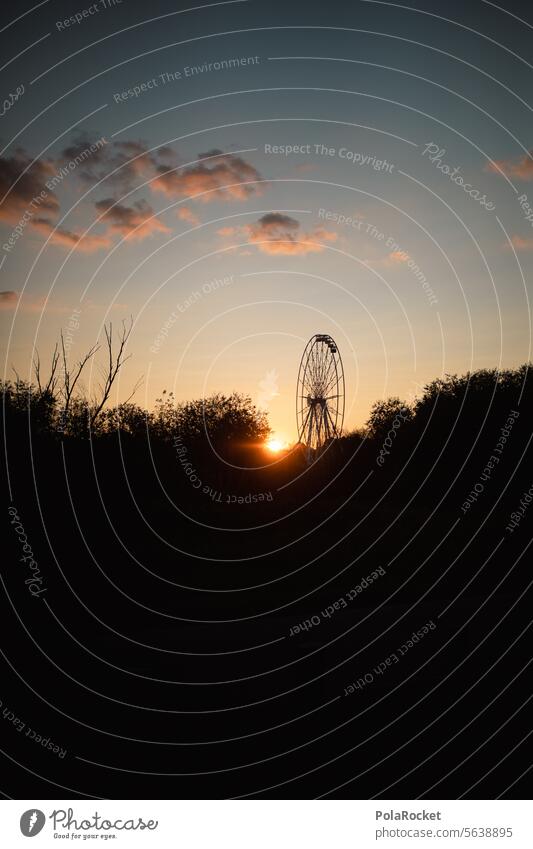 #A0# End of Days Ferris wheel Apocalyptic sentiment end time apocalyptic scenario Moody Fairs & Carnivals Light Sky Dark Sunset