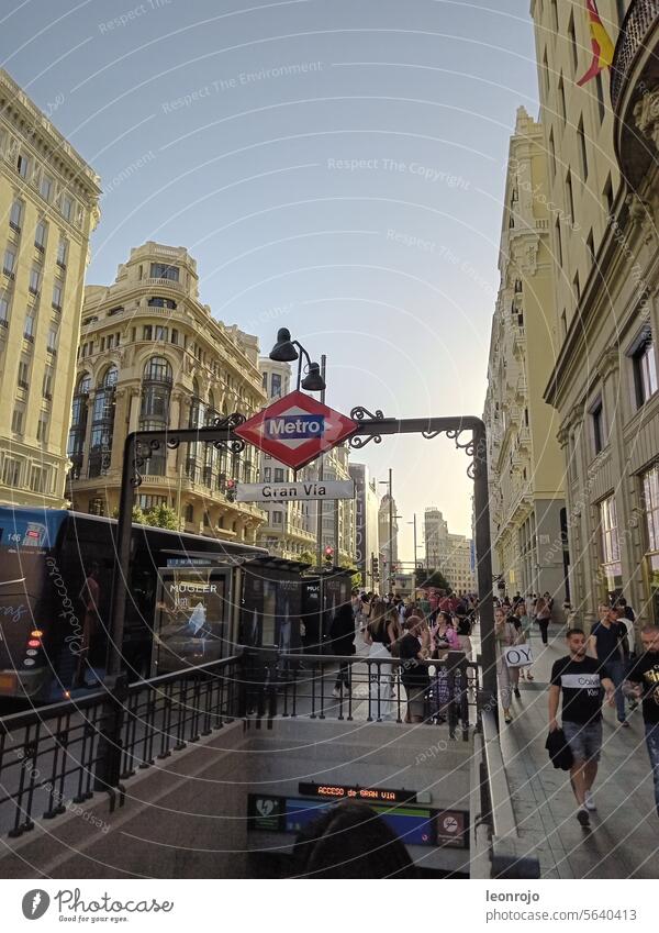 A street scene in the center of Madrid during the day in front of the Gran Via metro station! Street Scene Midday sun vacation travel touristic Tourism