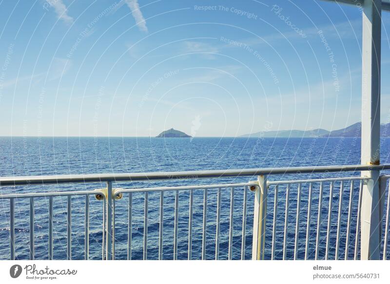 View of an uninhabited rocky island from the ferry to Elba Ferry Mediterranean sea Scoglietto di Portoferraio holiday planning Italy Ocean Ferry crossing