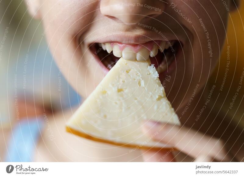 Anonymous teenage girl eating fresh cheese slice Girl Cheese Slice Bite Fresh Healthy Vitamin Nutrition Eat Teeth Food Delicious Yummy Teen Tasty Happy Organic