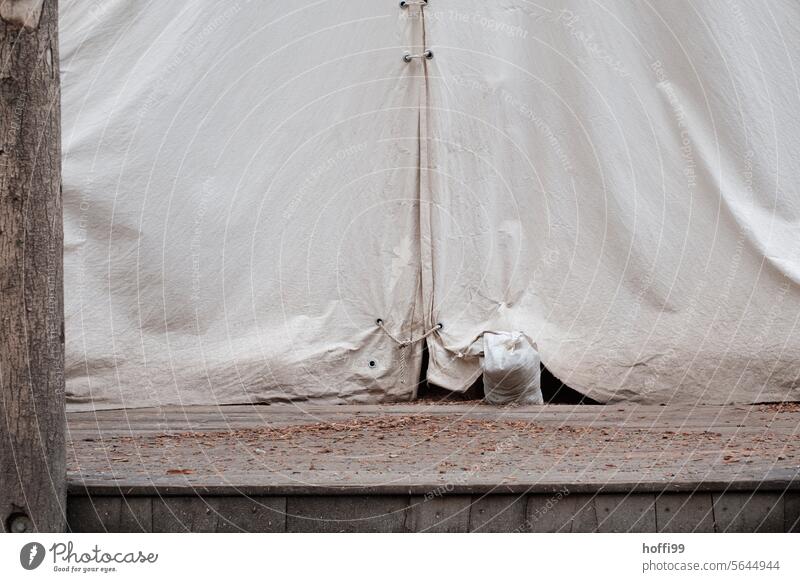 Closed entrance to a tent at a historic Christmas market Tent Yurt tent yurt Drape closed society closed business Christmas Fair forsake sb./sth. Retail sector