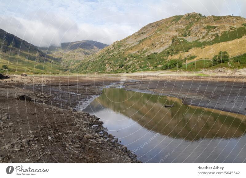 low water levels at Haweswater, Cumbria, UK haweswater Lake District National Park Summer Drought Water mountains Mountain travel landscape Exterior shot Nature