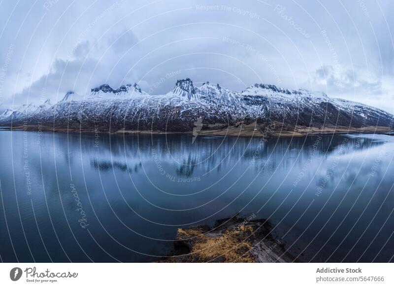 Tranquil mountain reflection in an Icelandic lake iceland landscape tranquil snow-capped serene nature water scenic travel tourism beauty natural remote