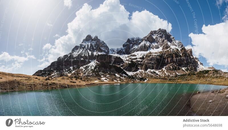 Panoramic view of the Pyrenees at Ordesa National Park panoramic pyrenees ordesa national park mountain lake tranquil reflection snow peak scenic vista