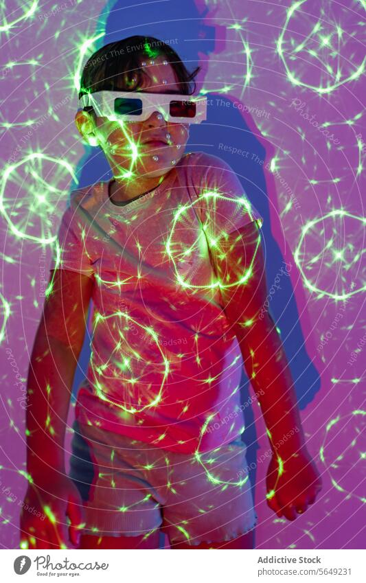 Happy girl in 3D glasses having fun in neon lights studio Girl Positive Glasses Neon Light Dance Enjoy Fun Leisure Glow Illuminate Studio Casual Bead Human Face