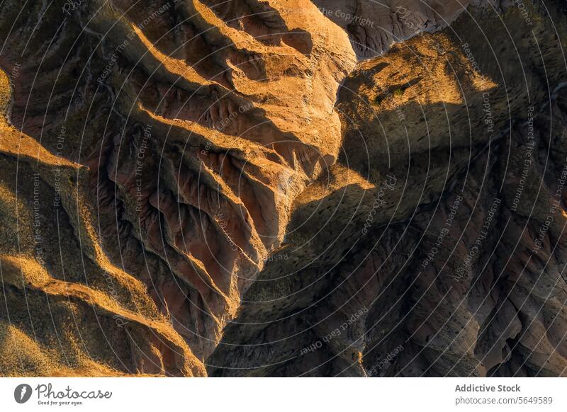 Overhead aerial view of the winding gorges at Burujón Toledo, showcasing the dramatic interplay of shadows and terrain landscape overhead natural beauty scenic