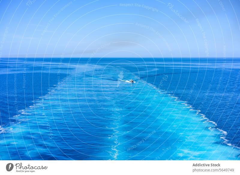 Ferry boat on sea water under blue sky ferry ocean picturesque nature horizon sunny distant vehicle float ripple bay waterfront sardinia italy europe travel