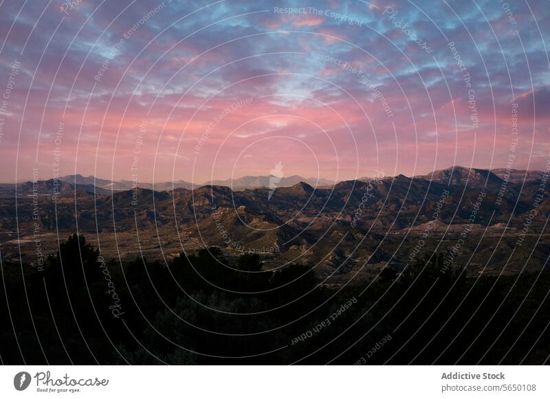 Serene sunset over Alicante mountain landscape alicante spain twilight serene glow tranquil beauty sky cloud dusk evening nature outdoor scenic view horizon