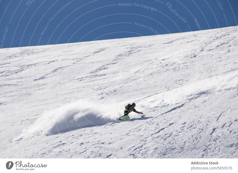 From below of Unrecognizable Snowboarder in action enjoying vacation on snowy mountain in Zermatt against blue sky Tourist Sport Mountain Slope Vacation Action