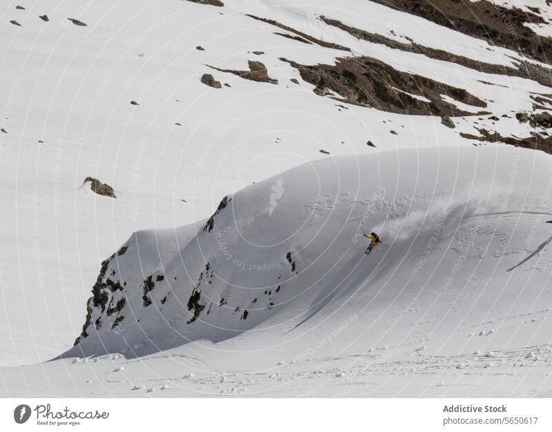 From above of anonymous Snowboarder in action enjoying vacation on snowy mountain in Zermatt Tourist Sport Mountain Slope Vacation Action Adventure Majestic