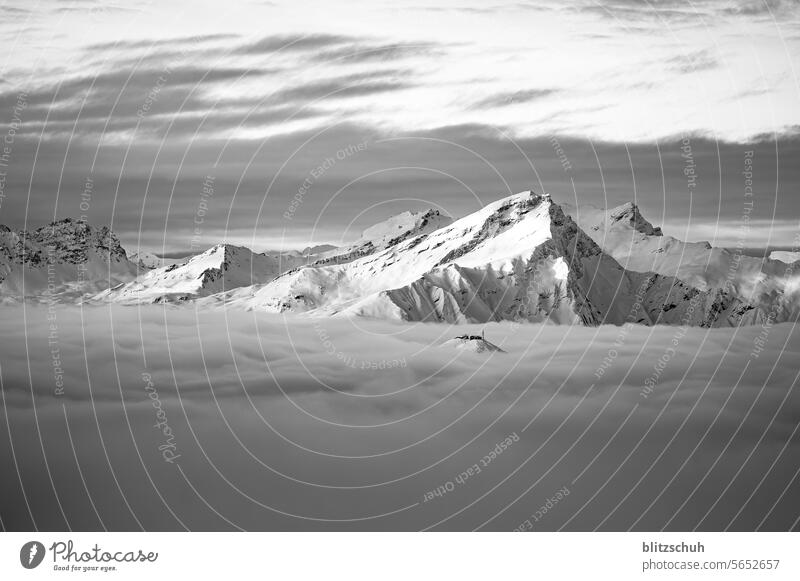 Mountain station just above the sea of fog in front of higher mountains, Graubünden, CH Switzerland Alps Swiss Alps alps Suisse lenzerheide Grisons