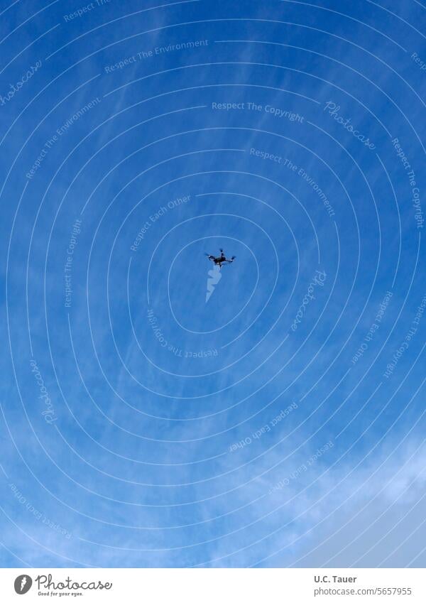 A drone in the blue sky Sky drone flight Clouds Spy Overview of the Flying Floating technology technique Blue Technology Aircraft Surveillance