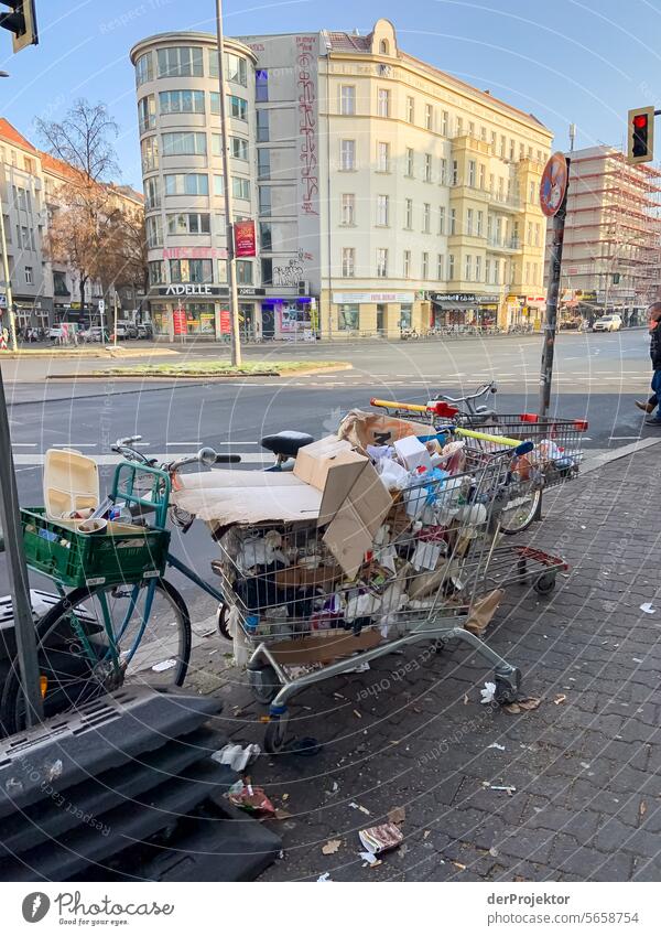 Street waste in Berlin I metropolis Freedom City Berlin center Sunbeam urban Beautiful weather City life Sunlight Light Historic Buildings Town Colour photo