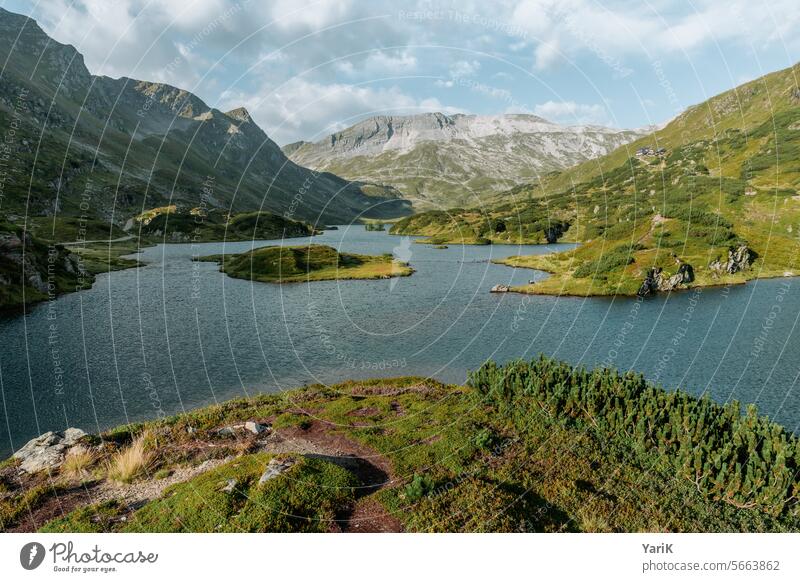 mountain paradise grassland Valley enjoying the view lit Lake Hiking Mountains in the background Austria Class outing Alps Sunbeam mountain panorama Brook