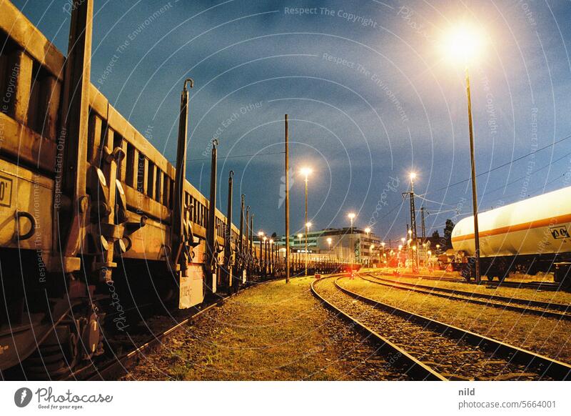 At night at Munich South Station II Train station Logistics Freight station Rail transport Railroad tracks Railroad system Deserted Colour photo