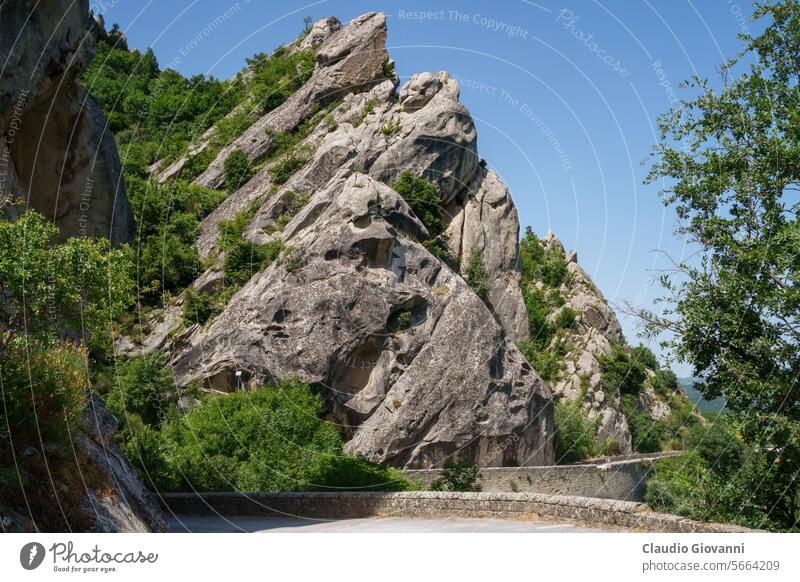 Mountain landscape near Castelmezzano, Italy Basilicata Europe July Pietrapertosa Potenza color day field green hill mountain nature photography plant road rock