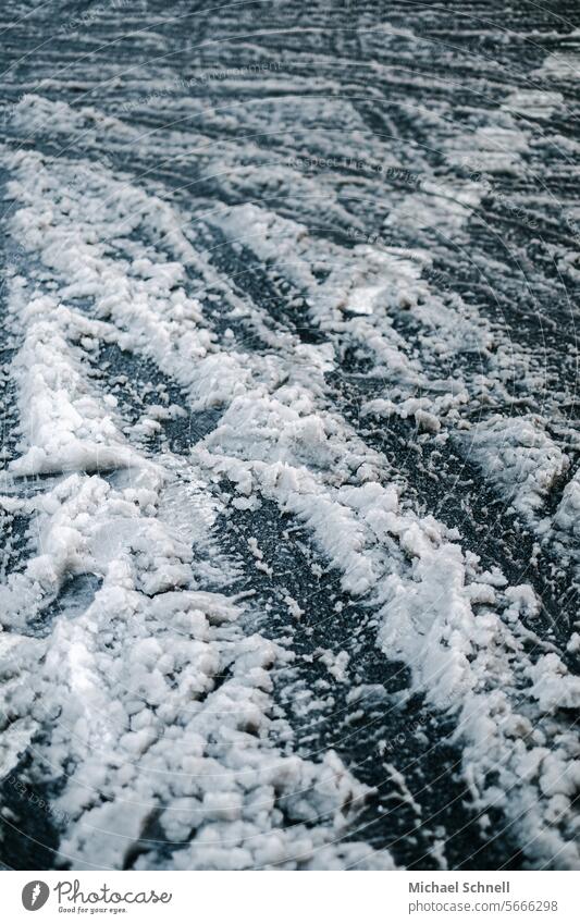 Slush on a road Snow mud Sludgy muddy road Street Lanes & trails Road traffic Motoring Traffic infrastructure Transport Winter Driving watch peril slip away