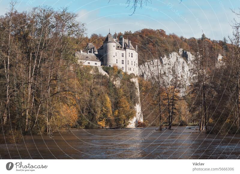 Medieval Walzin Castle on the banks of the River Lesse in the Wallonia region of southern Belgium. Gothic Revival castle stands on a steep rock in the province Namur