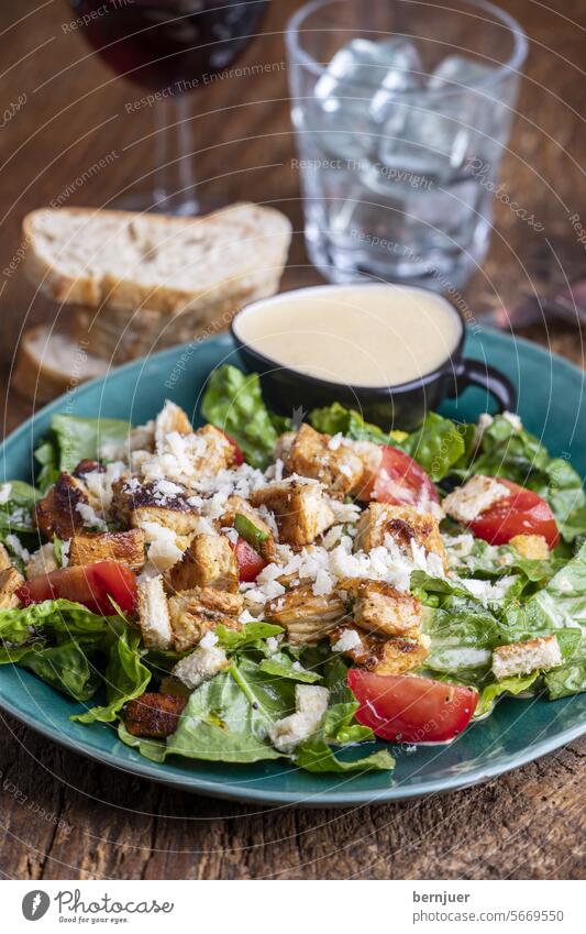 Caesar salad on a green plate Bread Fresh salubriously Meal Eating Dinner luscious Green White Vegetable Plate Lettuce Lunch Appetizer Kitchen Diet grilled bowl