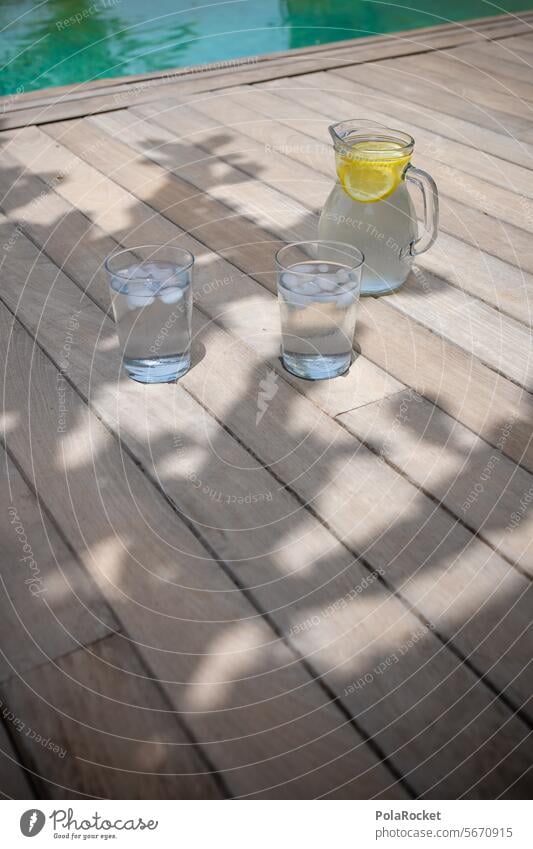 #A0# Day at the pool Blossom detail Detail Blossom leave petals Wind Blue Hotel pool Refreshment Cold drink Summer vacation pool party Pool view wooden floor