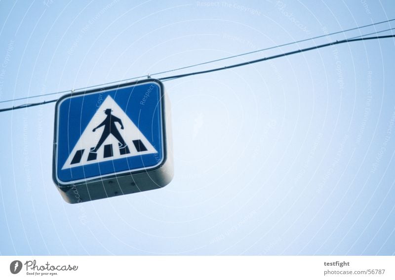 pedestrian Pedestrian Hang Suspended Road sign Zebra crossing Signs and labeling Blue Signage Rope