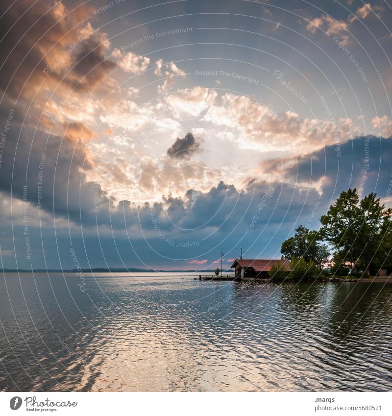 Boathouse at Chiemsee Calm Lake Romance Evening Jetty House (Residential Structure) Nature Horizon Panorama (View) Clouds Sky Beautiful weather Tree Dramatic