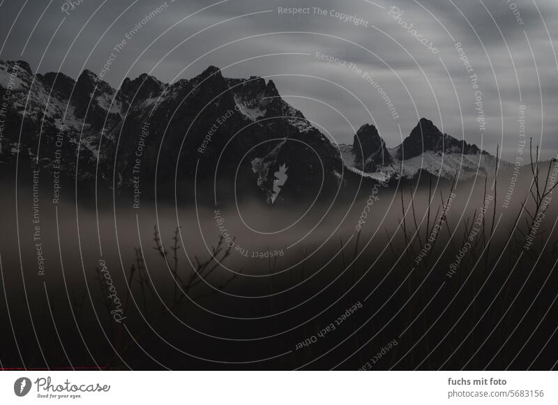 Fog rinds in the Alps mountains Long exposure Mountain Clouds Exterior shot Landscape Nature Rock Peak Weather Hiking Environment Sky Deserted Bad weather