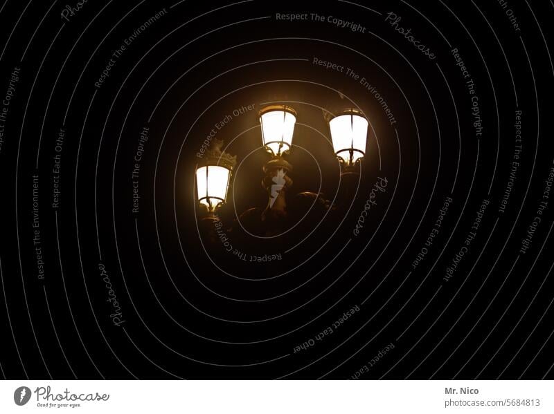 Three-armed streetlamp lantern light street lamps Street lighting Lantern Dark Night Light Lamp Lighting Twilight Energy Illuminate Electricity stream