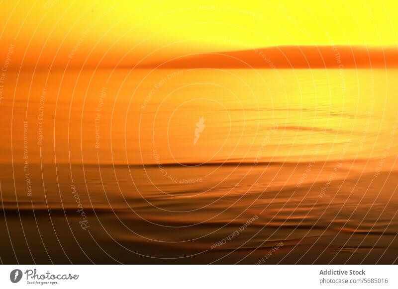 Serene sunset over calm ocean waves ripple serene tranquility warm hue reflection water nature scene gentle dusk evening horizon golden hour orange yellow