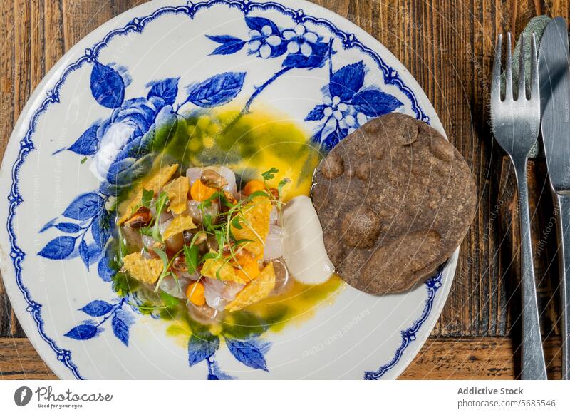 Gourmet fusion cuisine at a Michelin-starred Zermatt eatery michelin gourmet zermatt switzerland dish local seasonal ingredient plate traditional blue-patterned