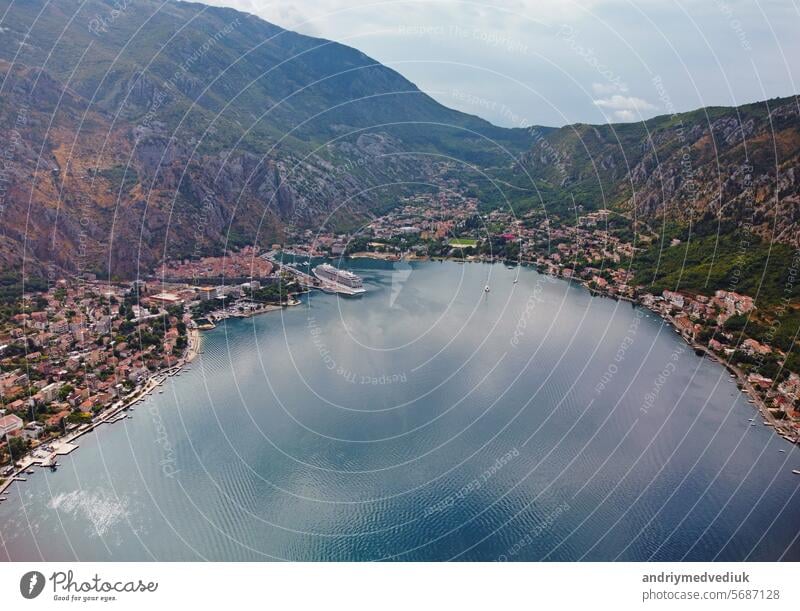 Aerial drone high view of Kotor bay, Boka Kotorska and coastal town Kotor, Cattaro, in Montenegro. Location place famous resort Montenegro. Adriatic fjord surrounded by rugged mountains