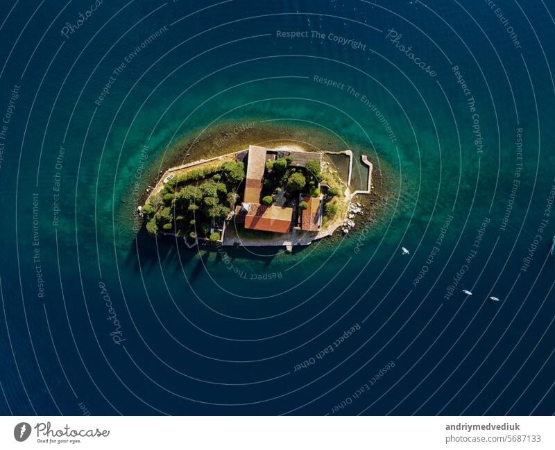 Aerial view of Our Lady of the Rocks or Gospa od Skrpjela and Catholic monastery Saint George in the bay of Kotor, in city of Perast, Adriatic sea, Montenegro. Tourism destination