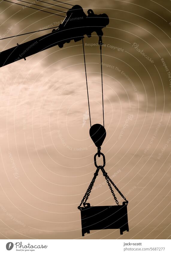 Hanging on the hook Dockside crane Logistics Crane Silhouette Depth of field Crate Monochrome rope hoist Lifting crane Neutral Background Sky Clouds Chain