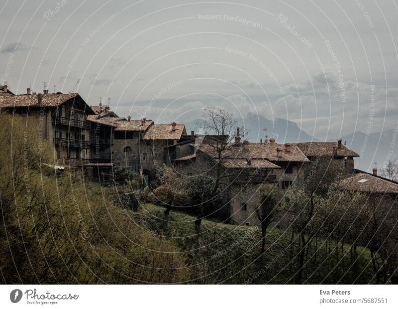 Canale di Tenno, medieval village in Italy Looking Tenno Lake Lake Tenno lago di tenno Lake Garda mountains Trentino Arco Riva del Garda Tourism vacation houses