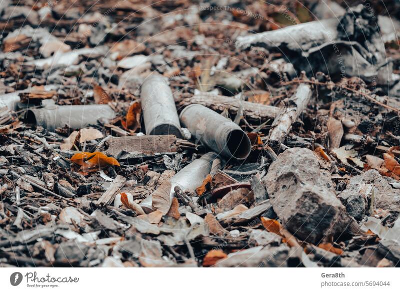 shell casings after a shooting battle in Ukraine Russia Ukrainian abandon abandoned army attack background blown up bombardment broken burned out caliber