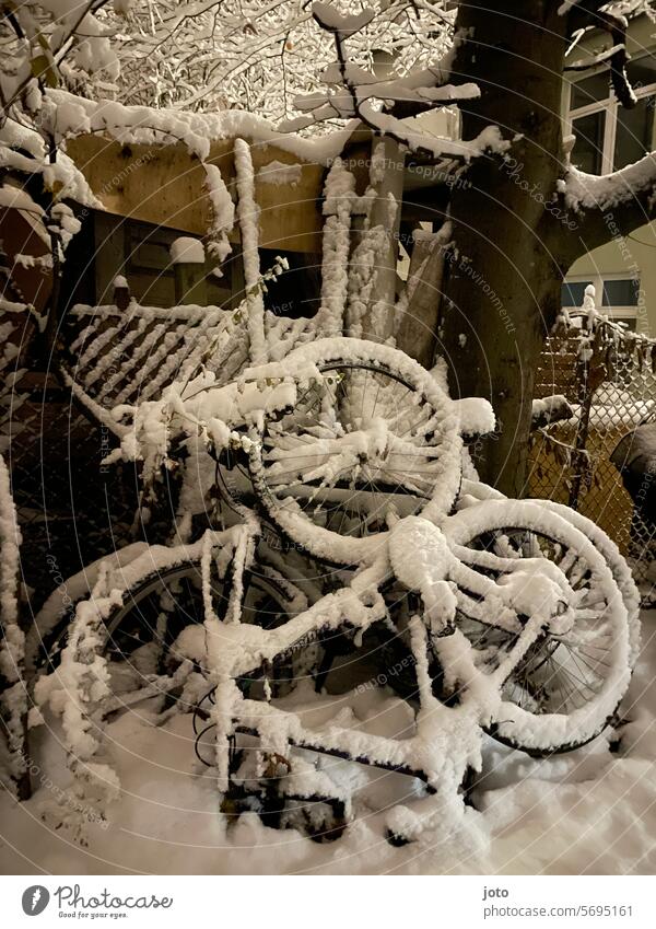 Snow-covered stacked bicycles Lines and shapes Winter January February March Frost Tracks Structures and shapes Contrast Rich in contrast icily icy cold Frozen