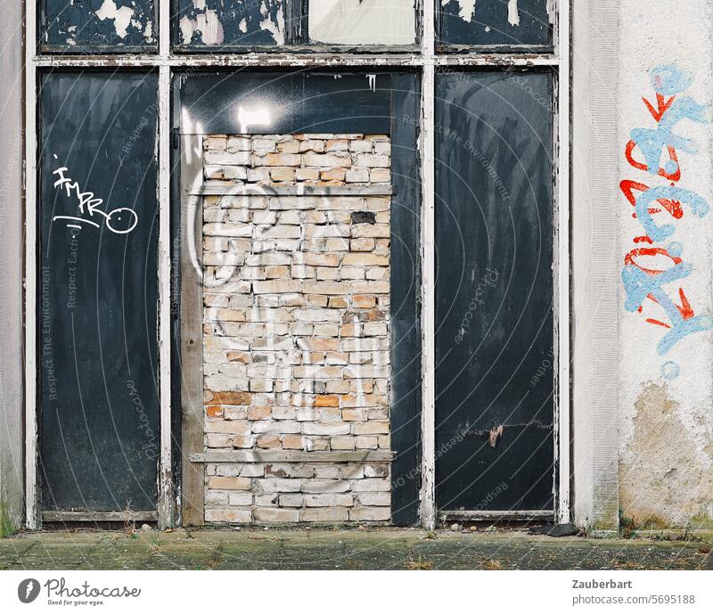 House wall, formerly modern portal with bricked-up door, graffiti Wall (building) Portal Modern stonewall WALLING UP bricked up Closed locked Entrance Way out