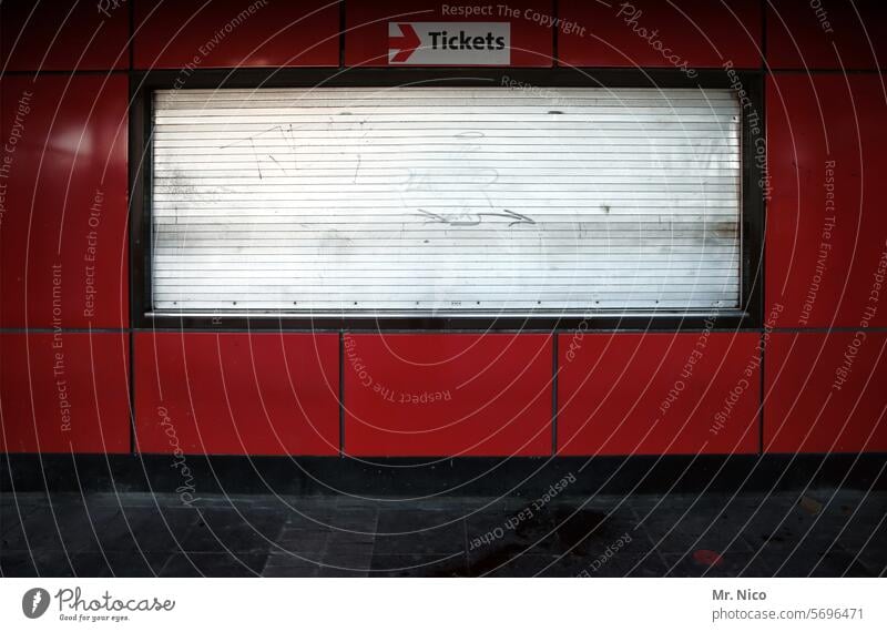 Tickets to go tickets ticket counter Window Kiosk Closed underground Tile Underground roller shutter Arrow somber Train station Station Silver Red Passage